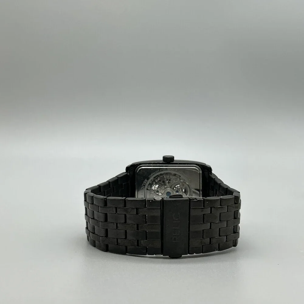 Relic by Fossil see photos